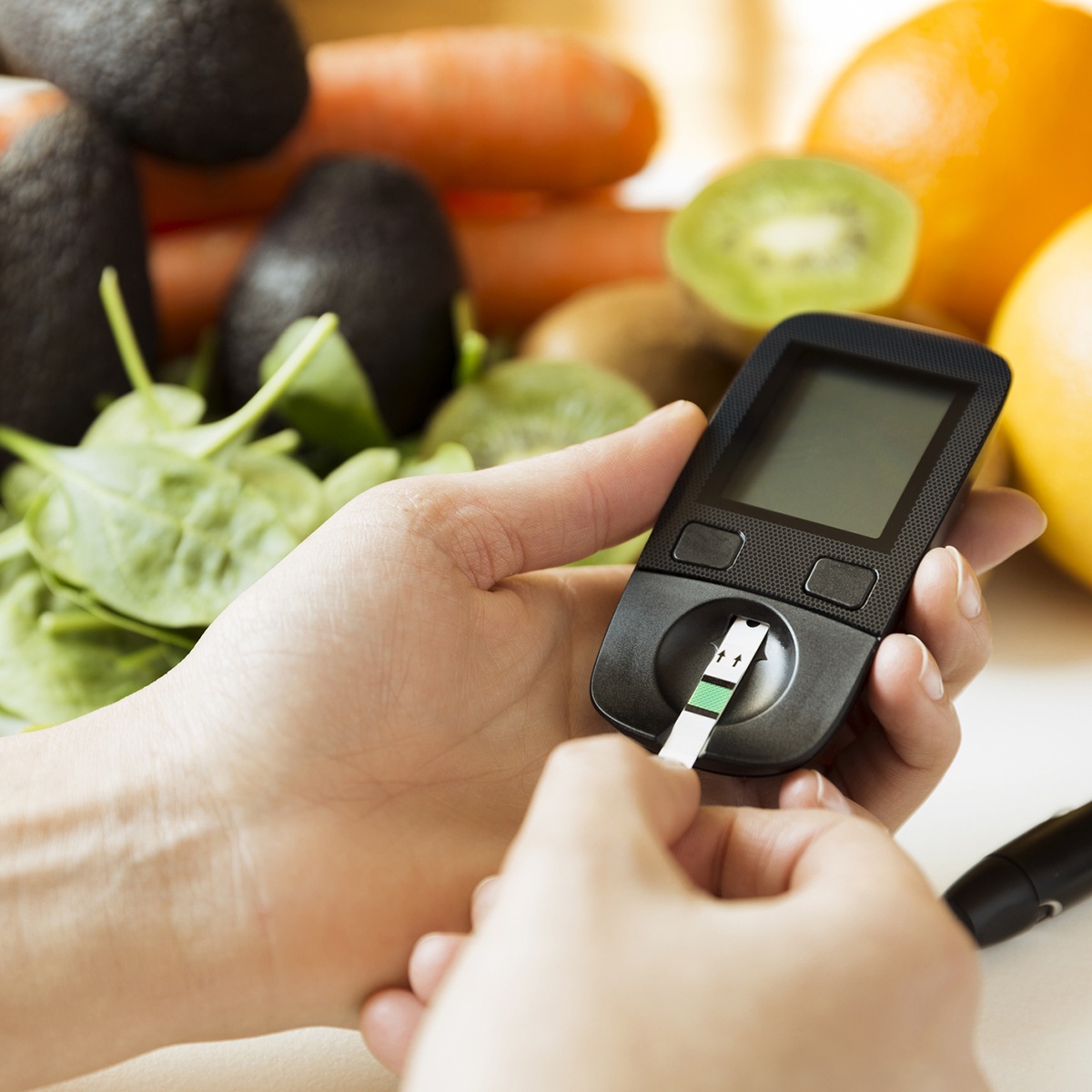 Person using glucometer
