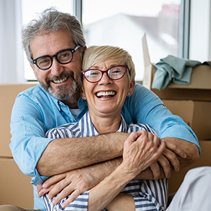 Couple smiling, embracing