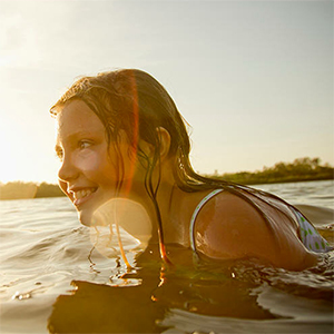  Child swmming in a lake