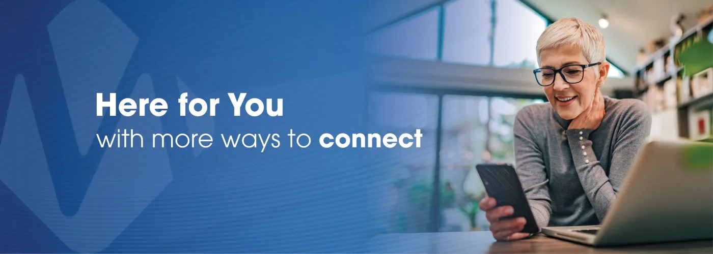 Banner with text reading "Here for You with More Ways to Connect"; photo of woman holding smartphone
